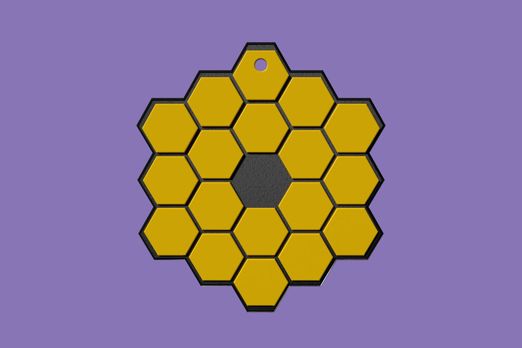 Front image of the James Webb Space telescope main mirror in the form of a keychain