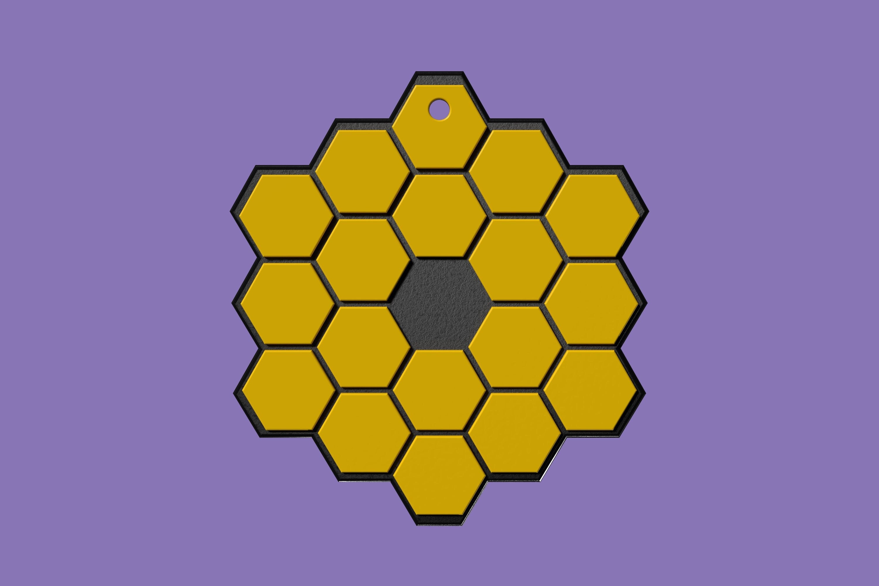 Front image of the James Webb Space telescope main mirror in the form of a keychain