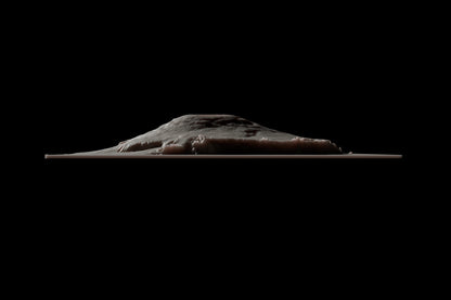 Side image of a 3D printed resin model of the mountain Olympus Mons, located on Mars.